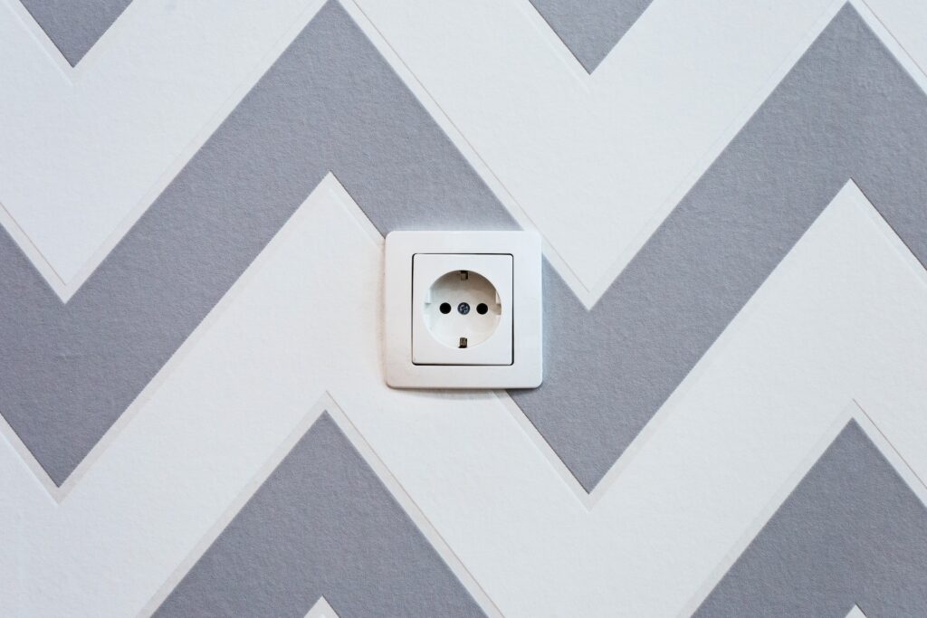 What Types Of International Adapters Are Included With The Wall Charger?